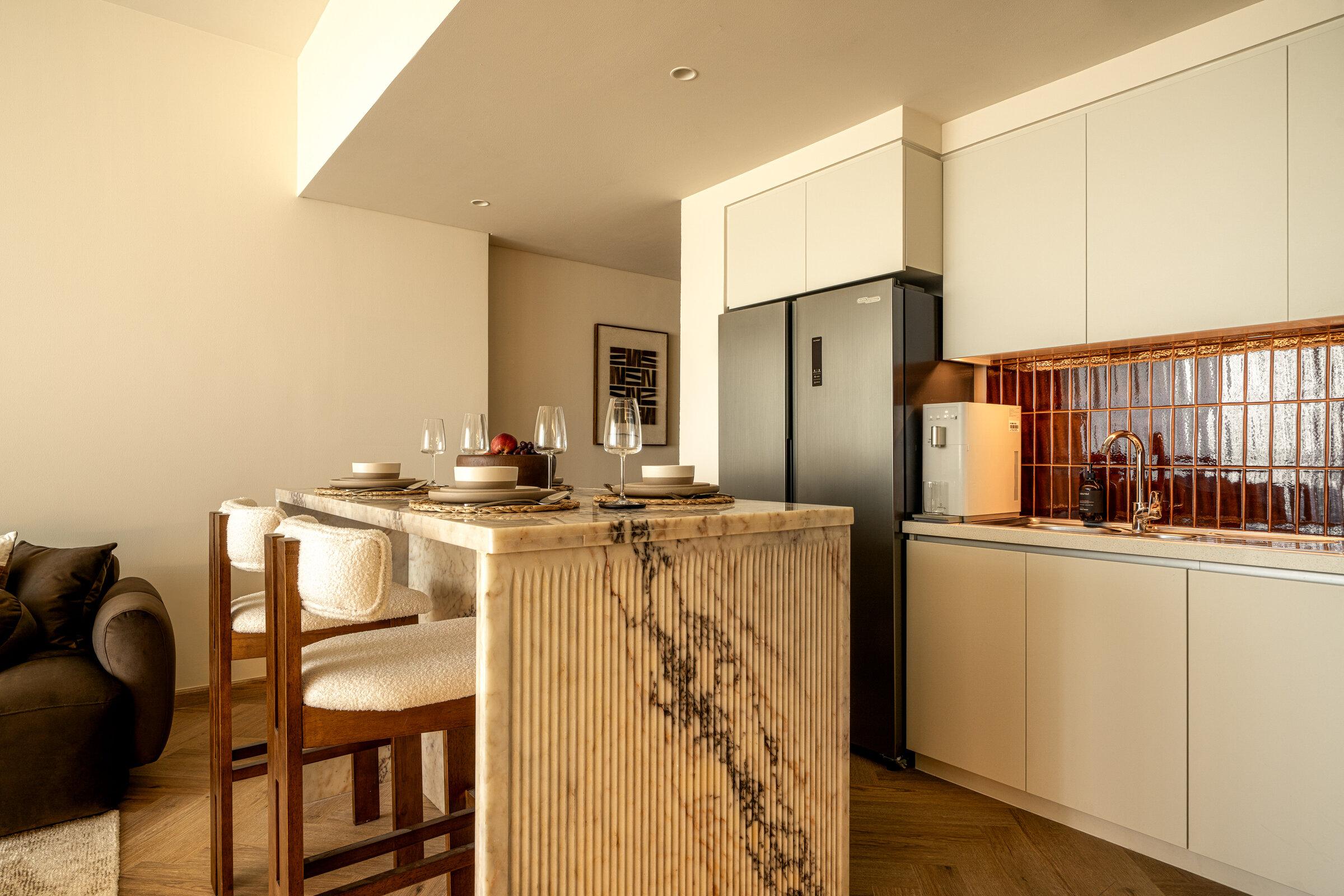 Dune Kitchen Island in Travertine at Seraya Residence 47